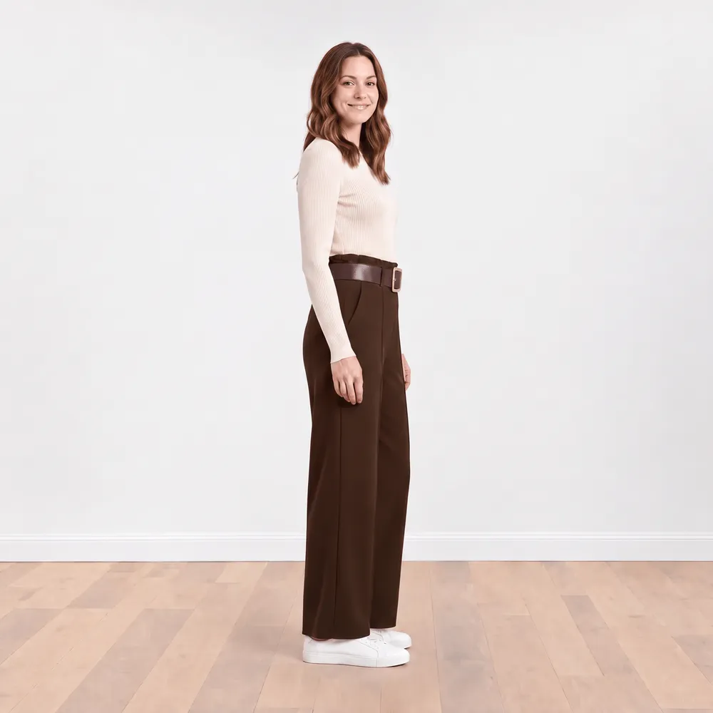Ellana Trousers in brown — side profile view showing high waist and leg width
