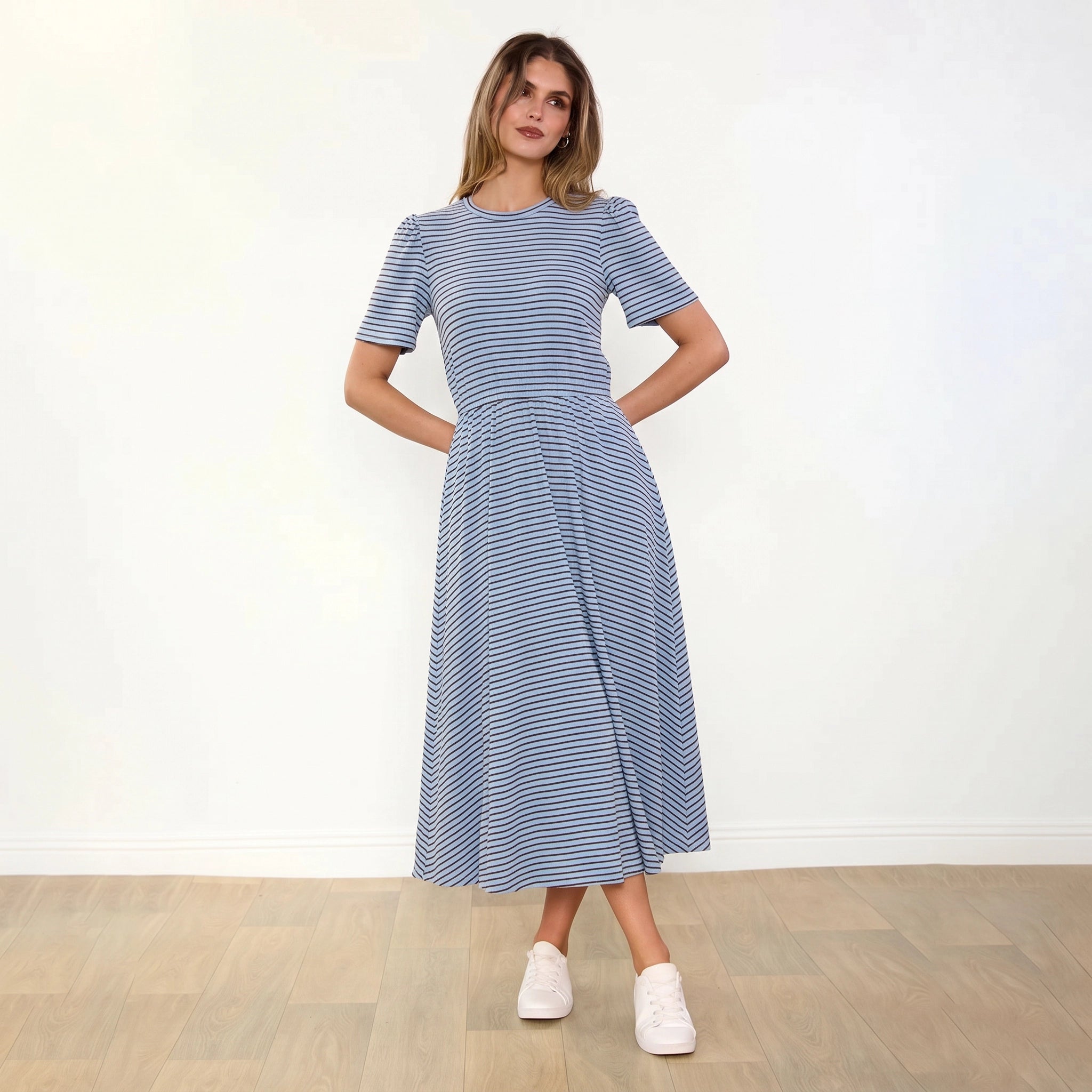Eilish Dress (Blue/Brown) - Front, hands behind back