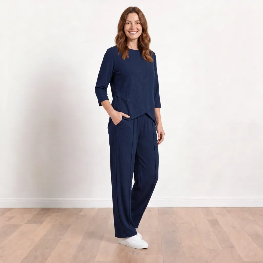 Lily Co-ord in Navy - Three-quarter angled view with hand in pocket on model Aisling