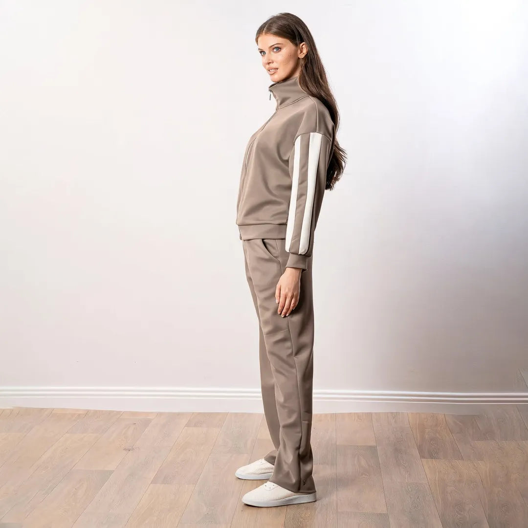 Aubree Co-ord in taupe — side profile showing ivory sleeve panel and wide-leg drape