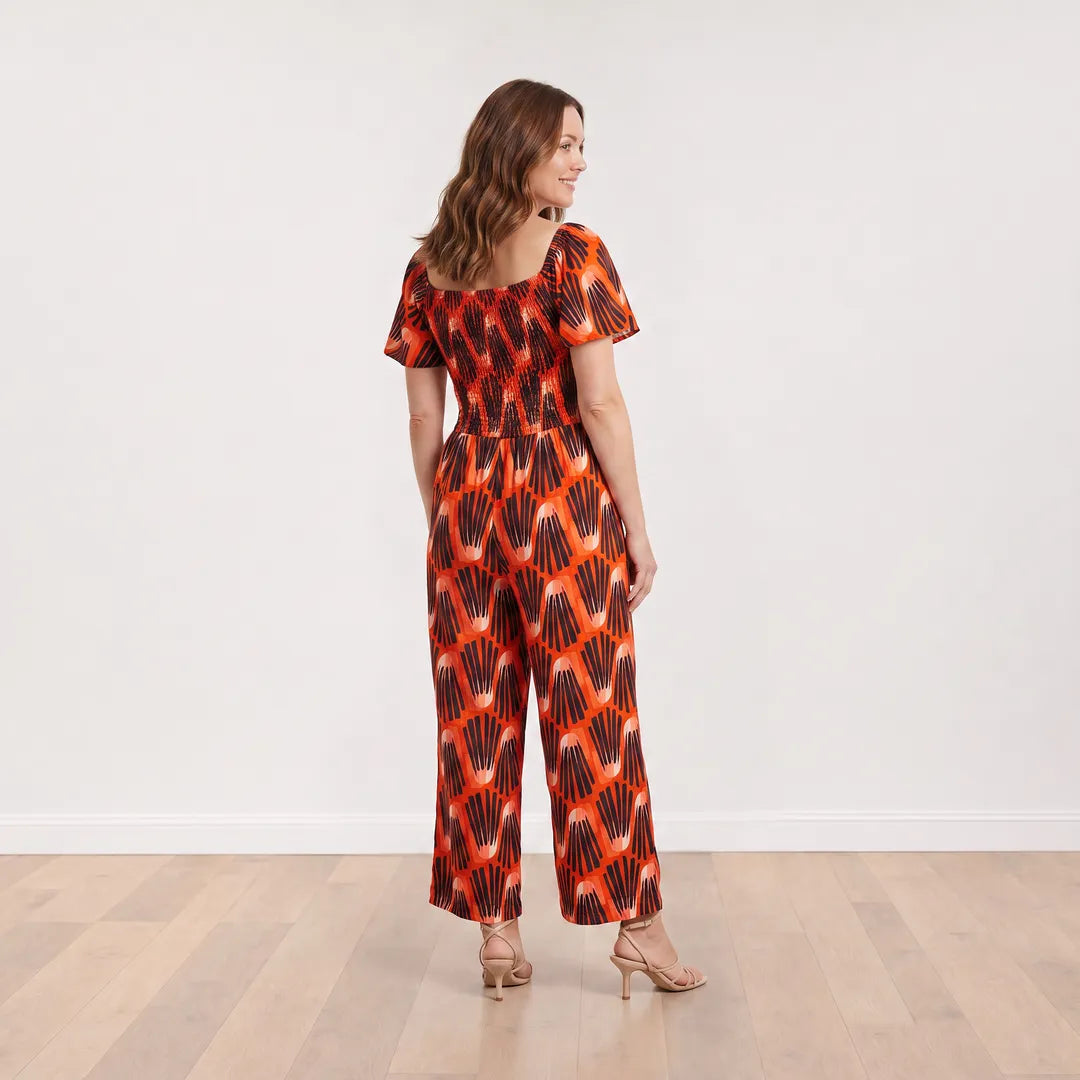 Ivan Jumpsuit in Abstract Saffron print, back view on model, ankle length