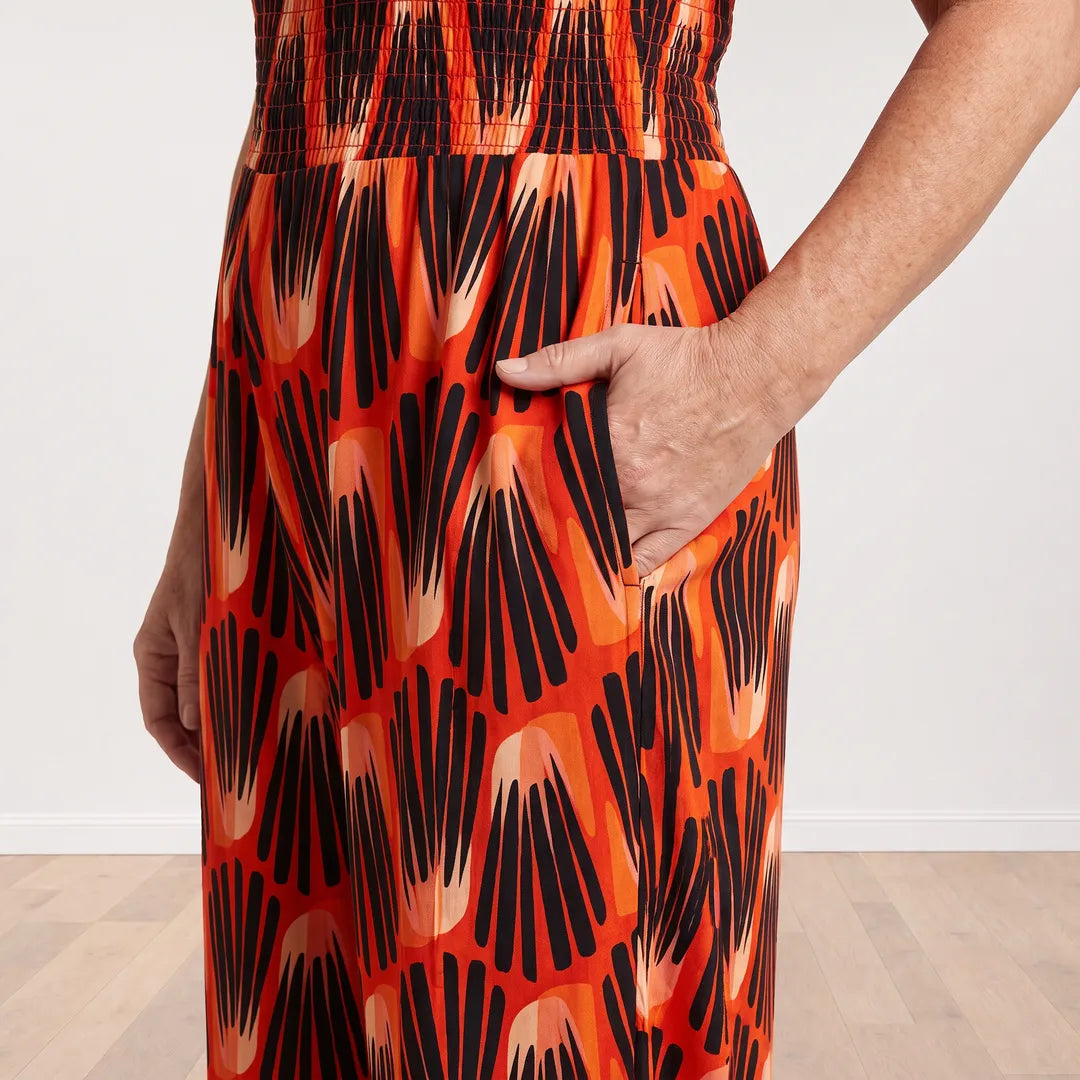 Ivan Jumpsuit in Abstract Saffron print, side seam pocket detail