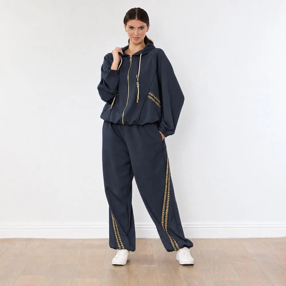 Kaelin Leopard Stripe Co-ord in Navy - front view, hand at collar