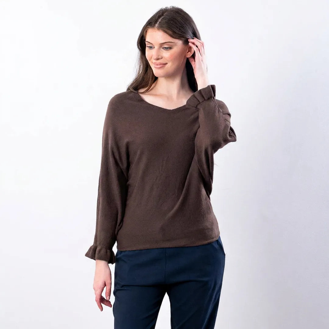 Close view of chocolate brown Lexie batwing knit top showing V-neck and fluted frill sleeve detail