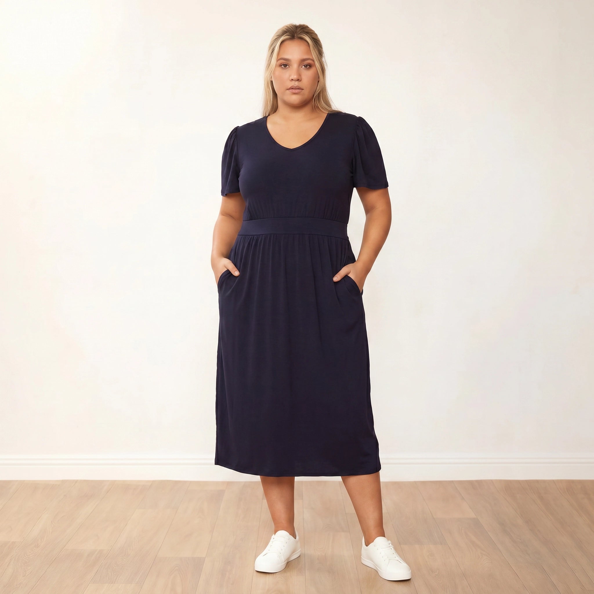 Lois Dress (Black) - Plus Size XXL - Front, hands in pockets, composed