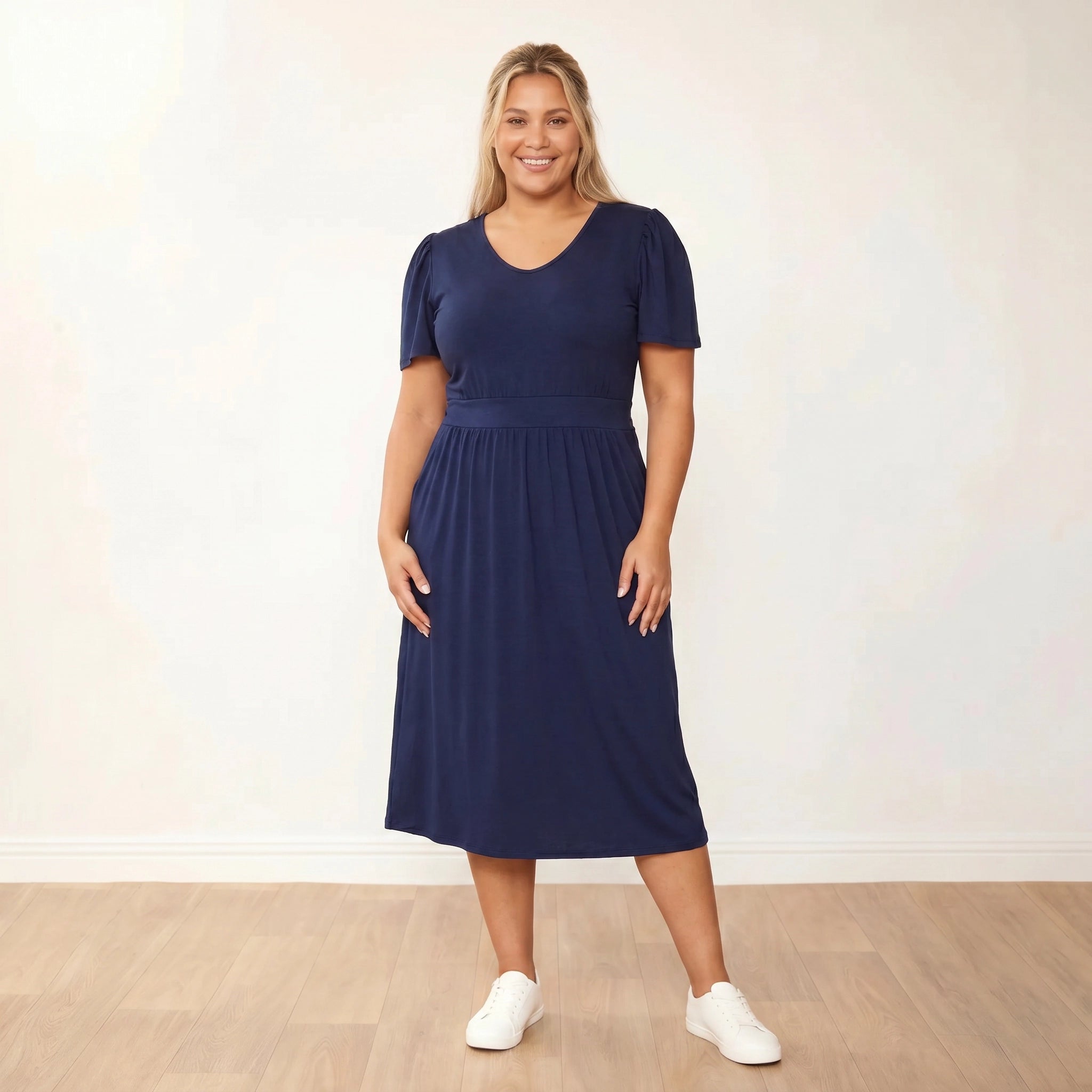 Lois Dress Navy - Plus Size XXL - Front smiling hands at waist