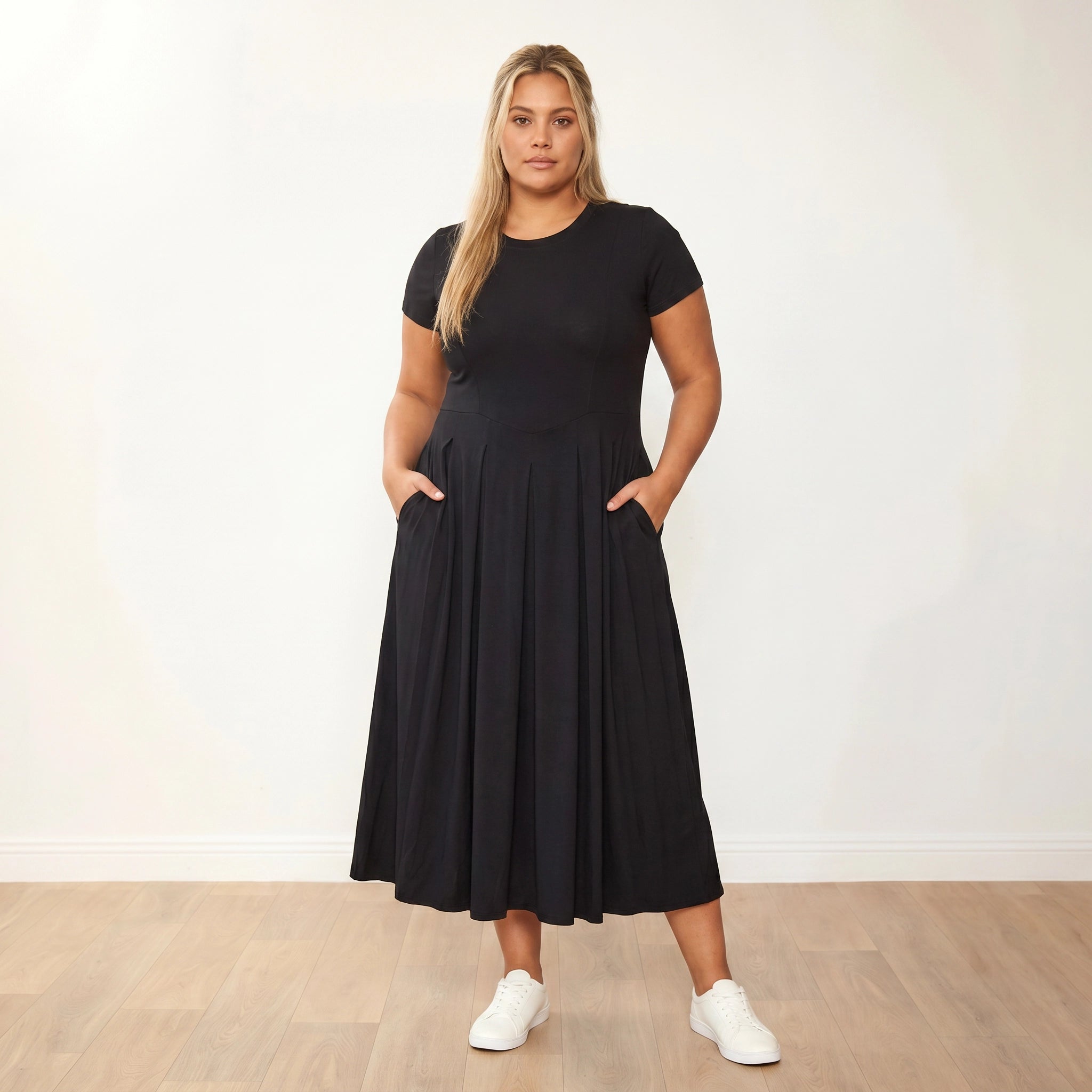 Polly Dress Black - Plus Size Model XXL, front hands in pockets