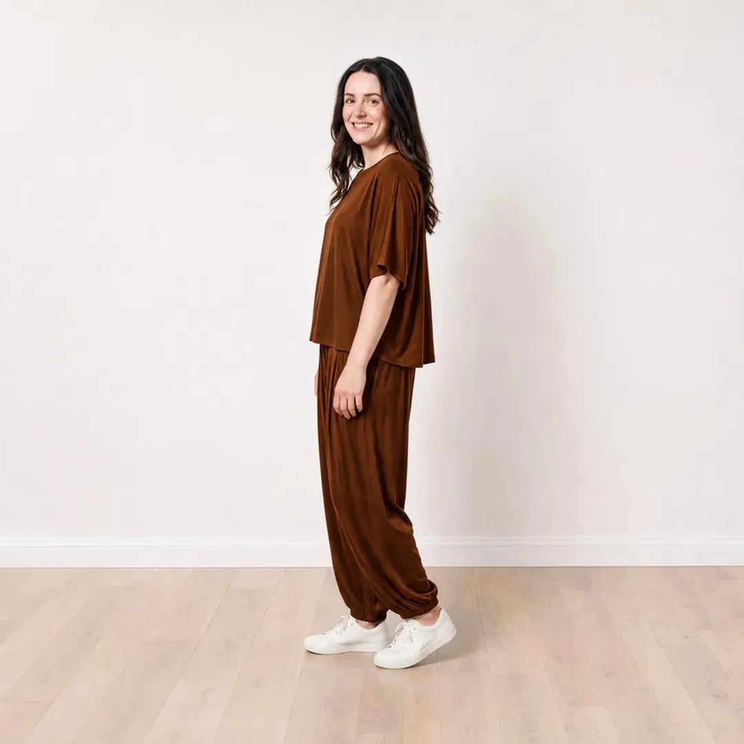 Róisín wearing the Orla Co-Ord in Chocolate Brown, smiling side profile