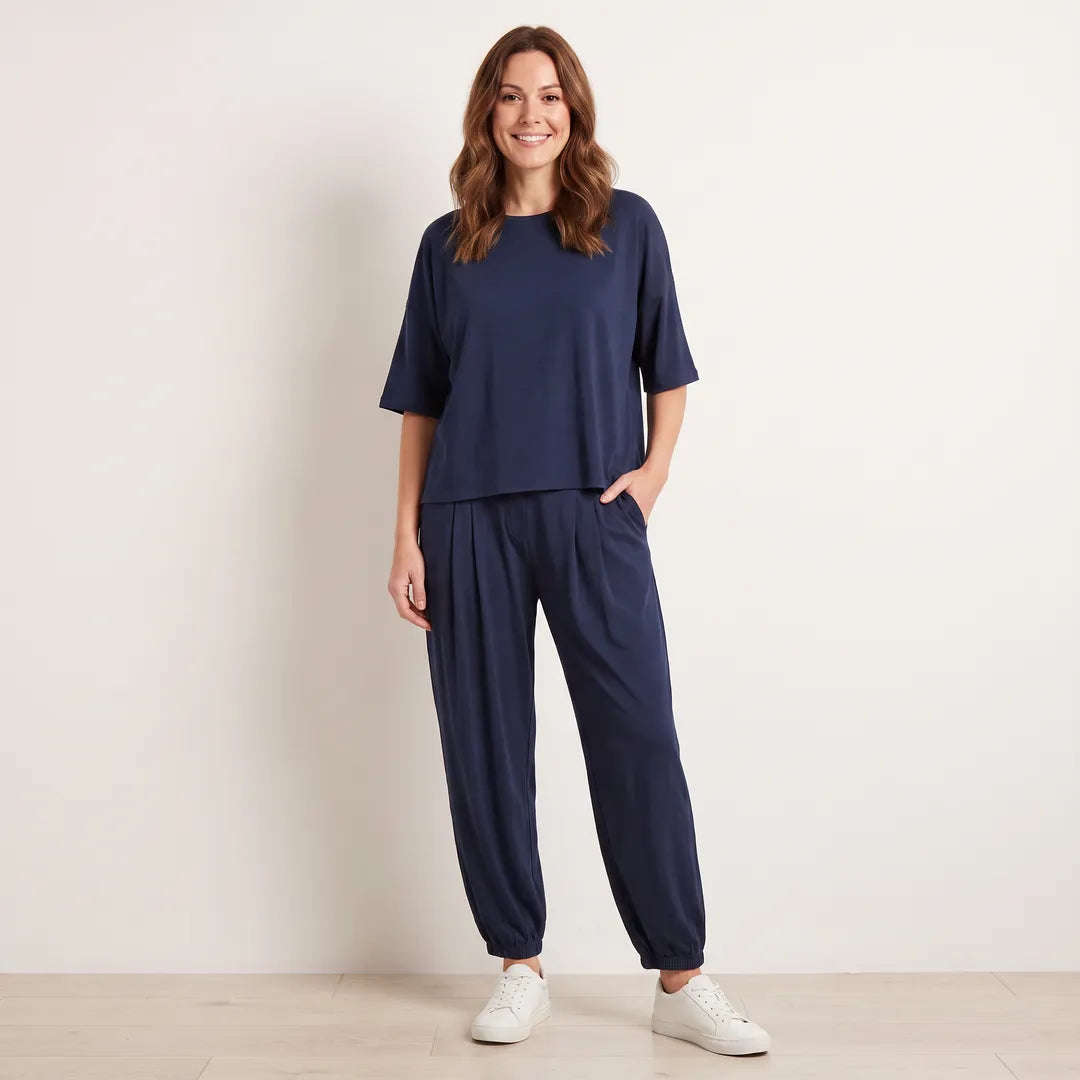 Orla Co-Ord in Navy on T_Aisling, relaxed full-length front view with hand in pocket