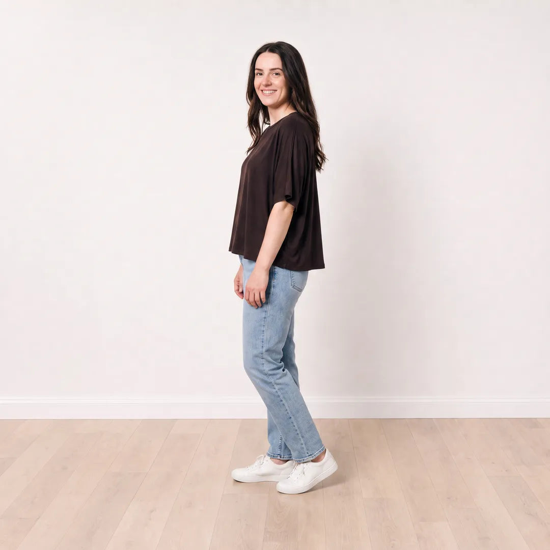 Orla Top in chocolate brown styled with light-wash straight-leg jeans, side view